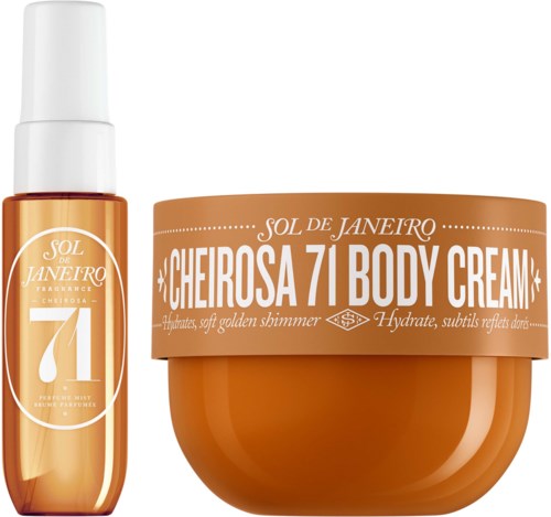 A body cream jar and a spray bottle with gold-colored packaging, labeled in Portuguese with shiny, soft finish words.