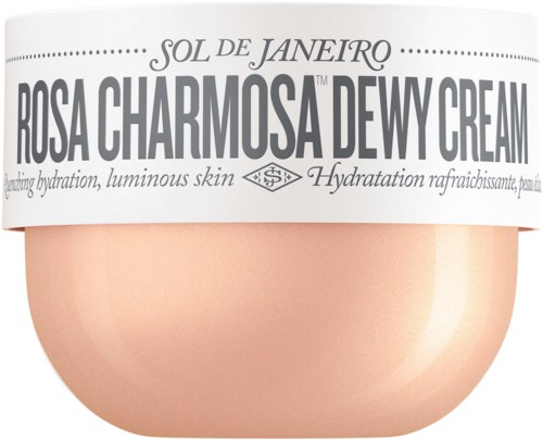 Kierros astia, jossa on valkoinen kansi ja vaaleanpunainen kerma sisällä, nimeltä 'Rosa Charmosa Dewy Cream' kosteuttamiseen.