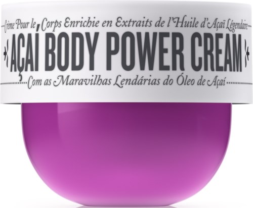 En lila burk med vit lock som är märkt 'Açaí Body Power Cream' i fetstil svart text.