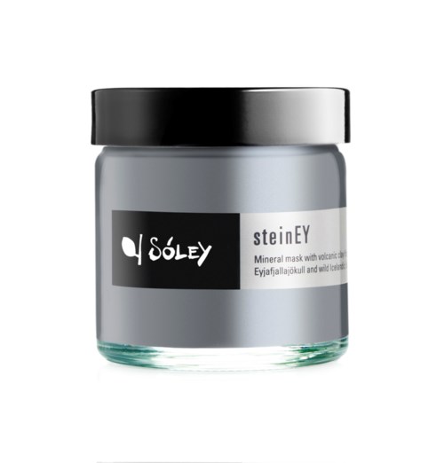 Et glass med grå mineralmaske med svart lokk og etikett som sier 'Soley' og 'SteinEy' med vulkanske og ville ingredienser.