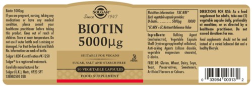 Etikett for et kosttilskudd med Biotin 5000 mikrogram, inneholder ingredienser som fyllstoffer og vitaminer, egnet for veganere.