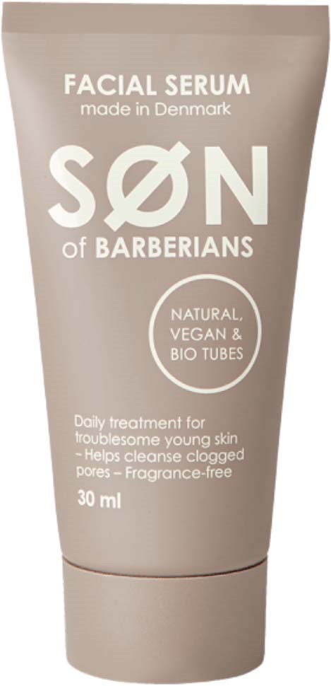En beige tube med ansiktsserum fra SØN of BARBERIANS, laget i Danmark, med etiketter om naturlige, veganske og økologiske ingredienser.