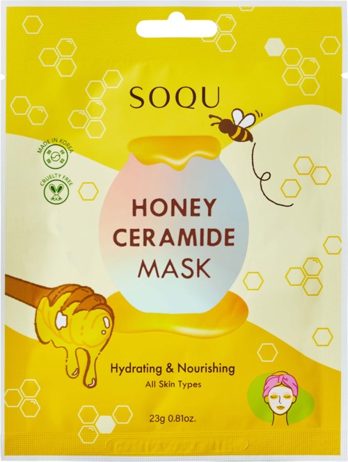 Pakke med honning ceramidemaske, en bie, en katt og en kvinne med rosa hår, vekt på hydrering og hudpleie.