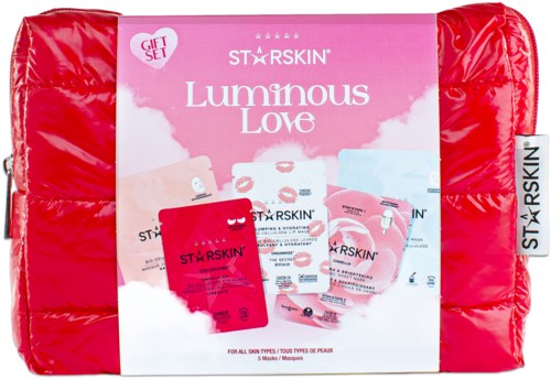 A pink and red beauty gift set box contains skincare products for all skin types, labeled 'Luminous Love' by Star Skin.