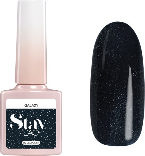 En flaska ljusrosa nagellack och en svart nagel med stjärnastro-mönster.