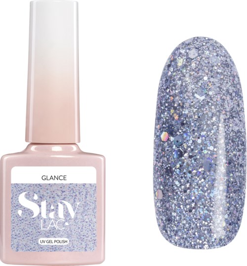 Butelka błyszczącego niebieskiego lakieru do paznokci obok próbki z glitterem.
