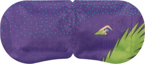 A sleep mask with a purple design, featuring a small hand and green grass on one side, dotted pattern on the other.