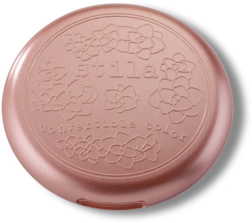 Pink round compact with flower designs and the words 'stilla' and 'coquette color' embossed.