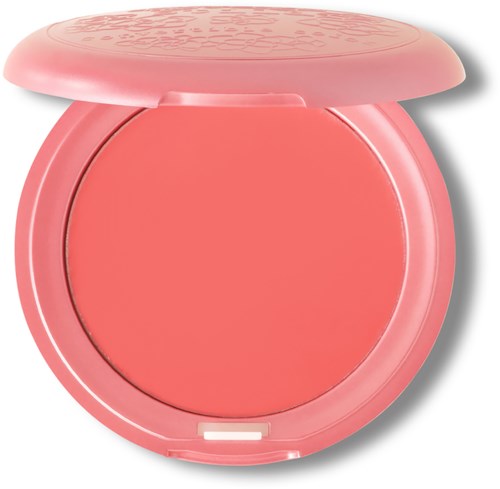 Pink round makeup compact with a floral pattern on the lid.