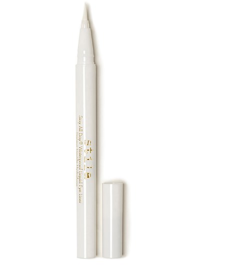 A white cosmetic pen with gold writing and a removable cap. It is slim and long, with a pointed tip.