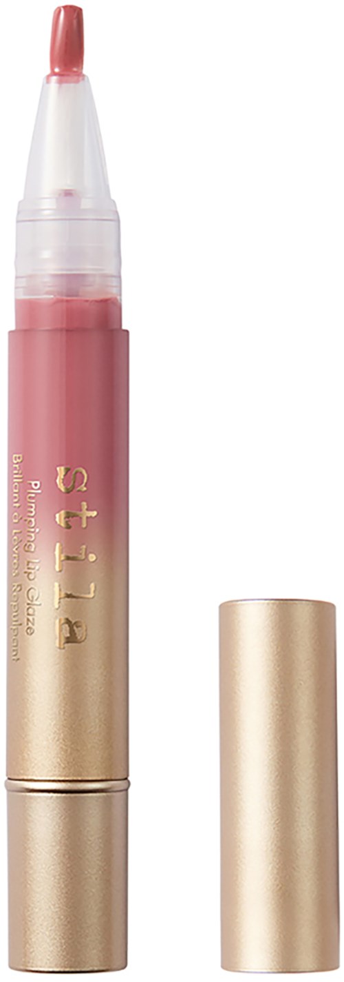 A pink and gold lip gloss tube with the cap removed, revealing the applicator brush.