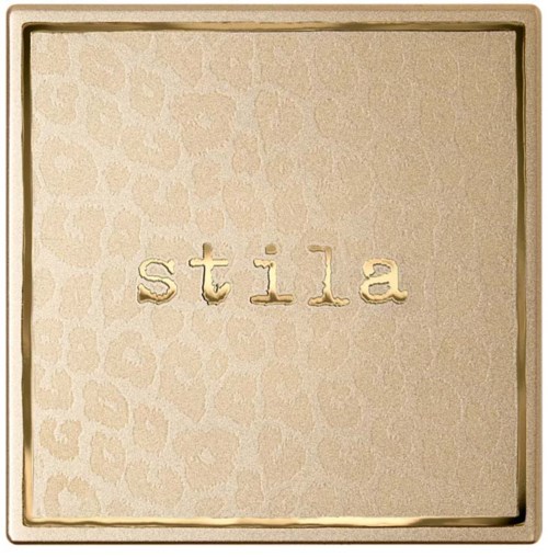 A beige square box with the word "stila" embossed in the center.