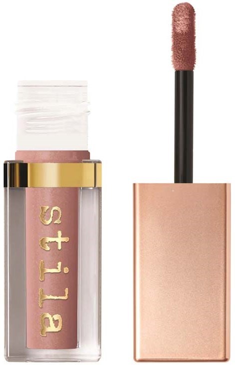 Cosmetisch lipgloss met goudkleurige en doorzichtige verpakking, en een sponsapplicator.