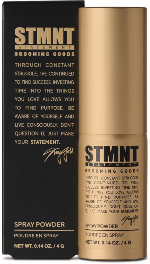 En svart och guldig box med en guld spraypulverflaska, märkt 'STMT Statement Grooming Goods.'