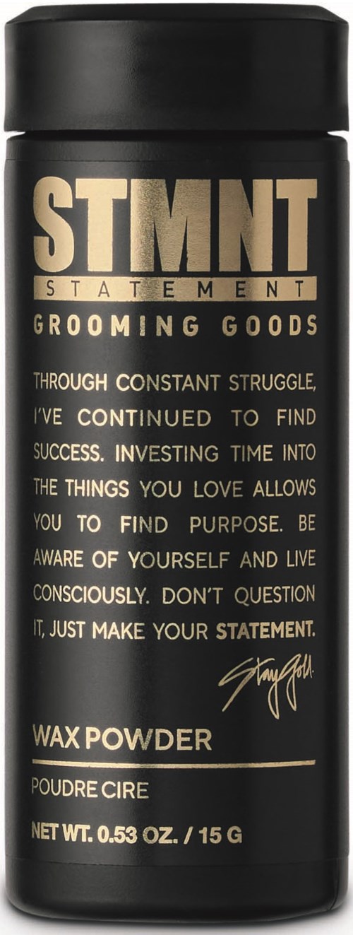 En svart behållare med guld- och vittext för grooming wax powder, märkt STMNT Statement. Enkel design.