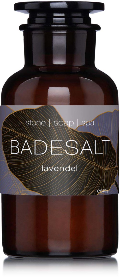 A brown bottle labeled BADESALT with lavender scent, designed for stone, soap, or spa use.