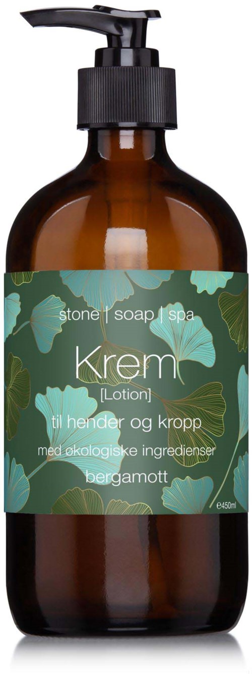Flaske med mørkbrunt glass, svart pump, inneholder hånd- og kroppslotion med økologiske ingredienser.