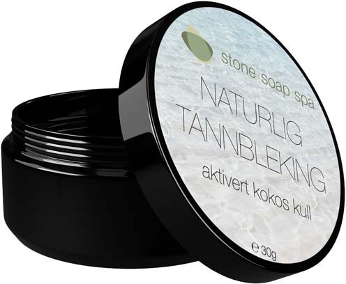 Musta pyöreä rasia, jossa lukee stone soap spa, luonnollinen ruskettuminen, kookoskuituaktivoitu.