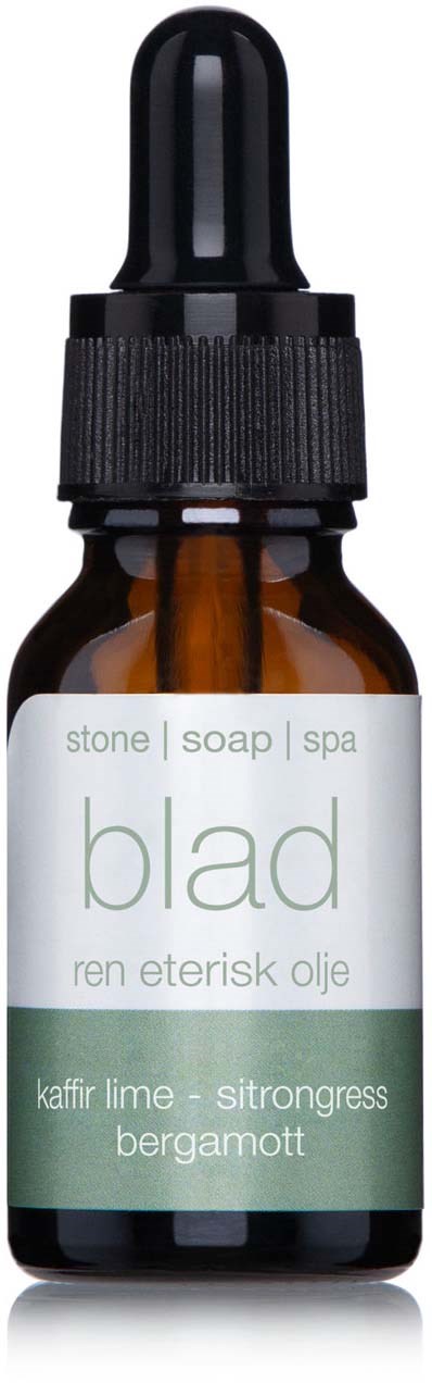 En liten brun flaske med svart dråpetappingslokk, merket 'blad' for hud, såpe, spa, med lime, sitrongress og bergamott.
