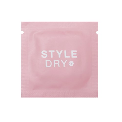 En lyserød pakke med ordene "STYLE DRY" og en lille bladlogo. Det ligner en produktpakke.