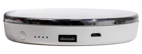 A white, round portable power bank with a USB port and small LED indicator lights.