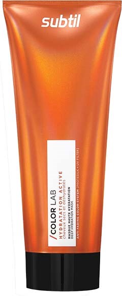A tube of Subtil hair color cream in orange with a black cap.
