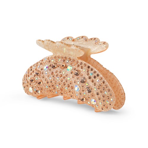 En rosa hårklämma dekorerad med många glänsande rhinestones, formad som en rosett.
