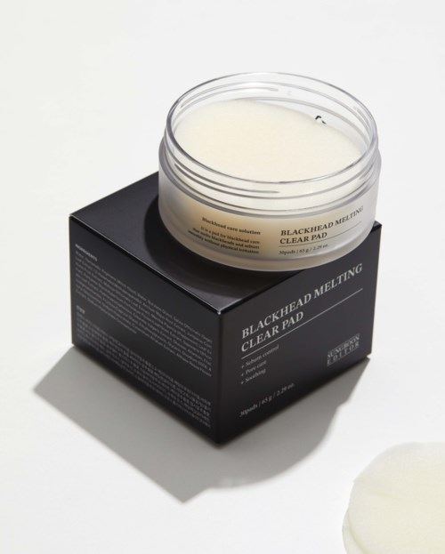 A jar of clear patch with black background box for melting skin or blackhead removal.