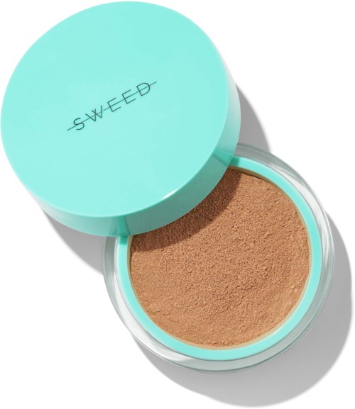 A round, turquoise container with a lid labeled "SWEED" contains light brown powder product.