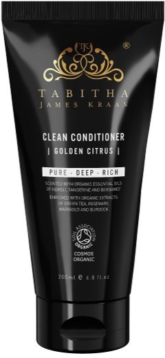 Svart tub med Tabitha James Kraan doftande balsam med guld- och vit text, främjar organiska ingredienser och en djup, rik doft.