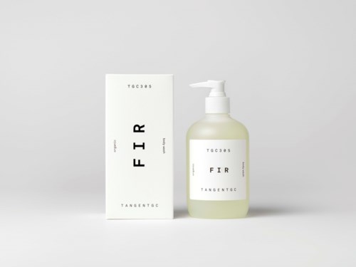A white box and a pump bottle with minimalist labels, showing a skincare or cosmetic product.