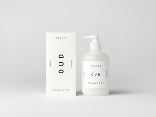 A white bottle with a pump next to a matching box, both labeled with simple black text.