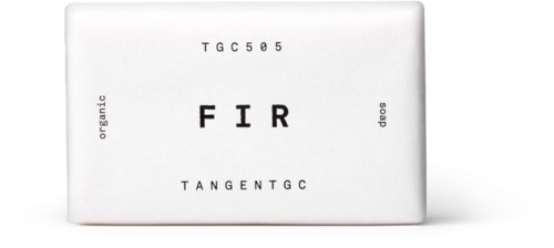 A white soap with text and symbols, including 'FIR' and other chemical or botanical terms.