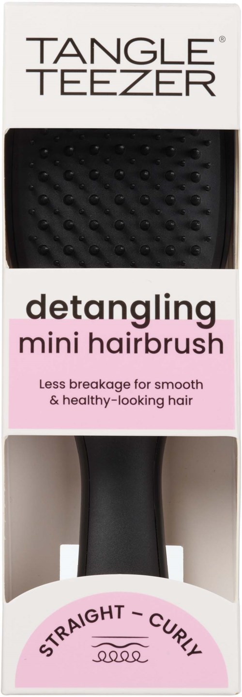 Eine schwarze Haarbürste mit strukturierter Oberfläche in einer Verpackung, gekennzeichnet für glattes oder lockiges Haar, fördert glattes Haar.