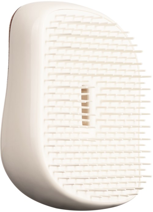 A white soap dish with horizontal slots and a central drainage hole.