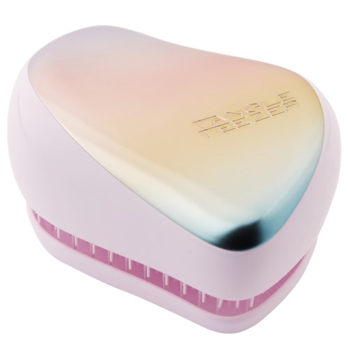 Ein rosa-weißes herzförmiges Gerät mit Tonleiste, beschriftet "TANGLE TEEZER," für Haarbürsten.