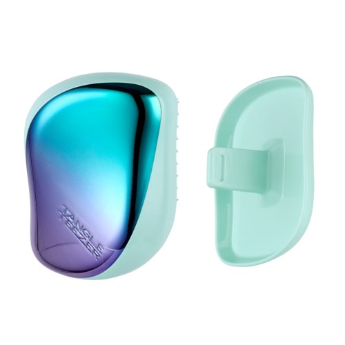 A small device with a blue and purple reflective surface, and a separate light mint green cover.