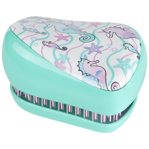A small, mint green case with a flip cover featuring colorful sea horses, starfish, and other sea creatures.