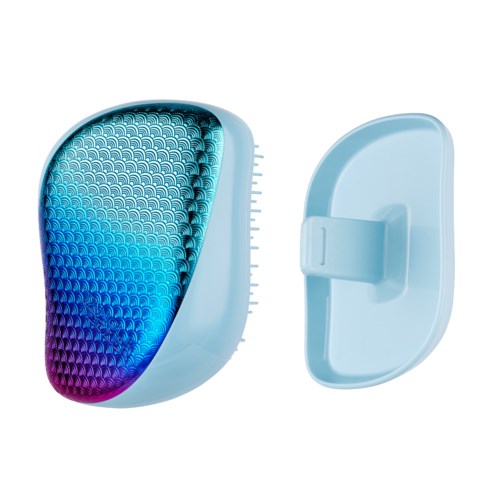 Small blue device with textured surface and removable cover. Likely a gadget or compact electronic tool.
