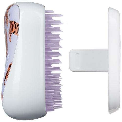 A white electric toothbrush with a tiger design on the handle and purple bristles.