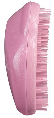 Pink hairbrush with many bristles and a smooth, curved handle.