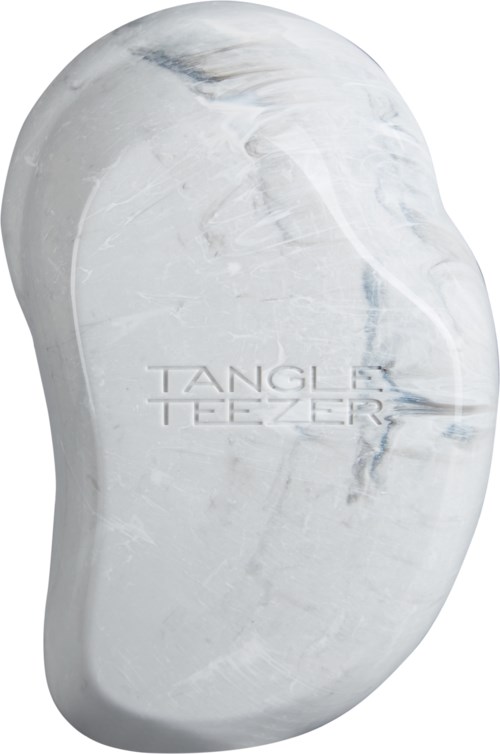 A white Tangle Teezer hairbrush with a smooth, curved shape and the brand name on it.