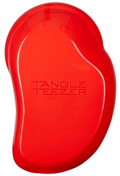 A red Tangle Teezer hairbrush with a rounded, ergonomic shape and the brand name on its surface.