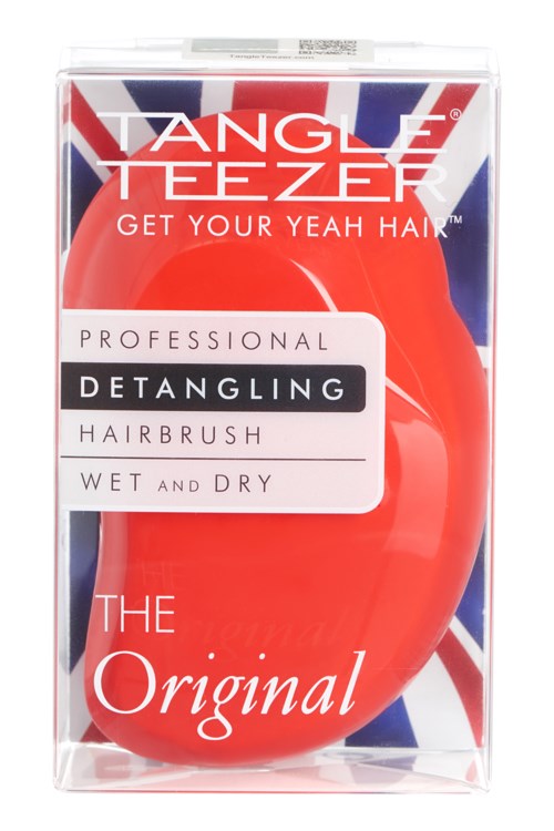 A red hairbrush in a clear box with a Union Jack flag background and text about detangling and professionalism.