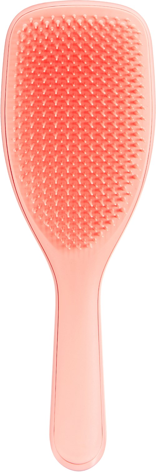 A pink hairbrush with a rounded rectangular shape and many small bristles.