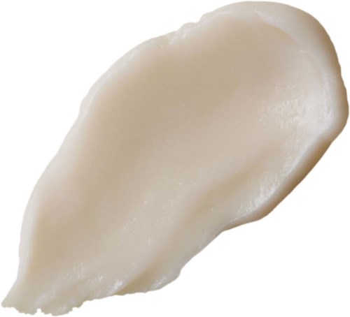 Een dot witte slag of saus op een witte achtergrond. Glad en licht glanzend uiterlijk.