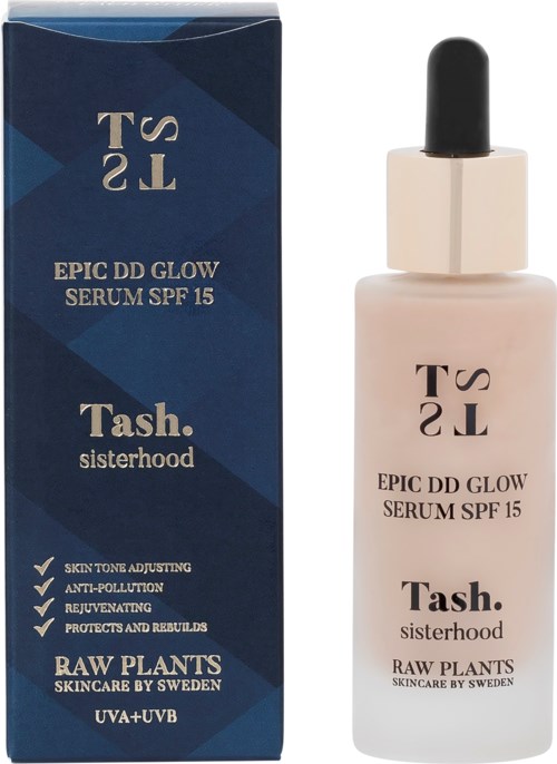 En hudvårdsserumflaska och box märkt 'Epic DD Glow Serum SPF 15' med 'Tash. sisterhood' och växtingredienser, skyddar huden.