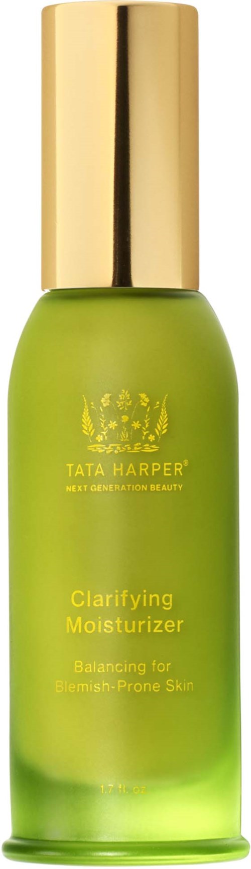 Grønn fuktighetskremflaske med gullkork, merket Tata Harper Clarifying Moisturizer for hud med urenheter.
