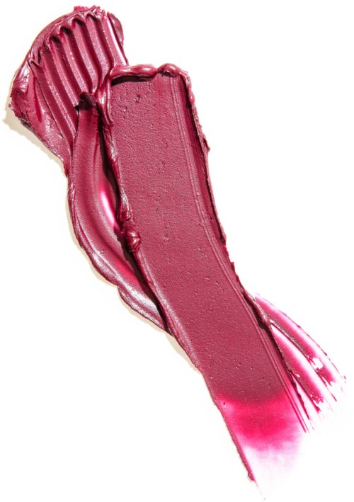 En smet av rosa läppstift med glänsande, slät yta och ett räfflat, kurvat utseende.
