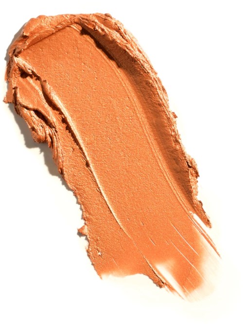 Orange makeupprovsbrytning på vit bakgrund med släta och texturerade områden.